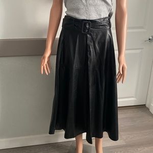 Black skirt maxi from artificial peel